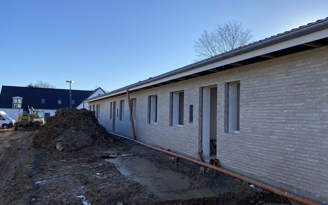 Ejendomsudviklere søger lån til opførelse af rækkehuse som del af et boligprojekt i Nordsjælland